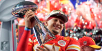 Kansas City Chiefs quarterback Patrick Mahomes celebrates with the trophy after the team's Super Bow win on Feb. 11, 2024, in Las Vegas.