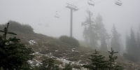 A coating of snow is seen below ski lifts at Sugarbowl Ski Resort in Donner Summit, Calif.