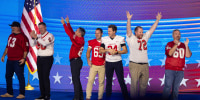 Former members of Democratic vice presidential nominee Tim Walz, high school football team during the third day of the Democratic National Convention at the United Center in Chicago on Aug. 21, 2024.