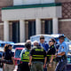 Police gather outside Apalachee High School.