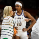 Head coach Kim Mulkey of the LSU Lady Tigers talks with Angel Reese #10 of the LSU Lady Tigers in the third quarter during the semifinals of the SEC Women's Basketball Tournament at Bon Secours Wellness Arena on March 09, 2024 in Greenville, South Carolina.  